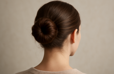 chignon bun sur nuque d'une femme